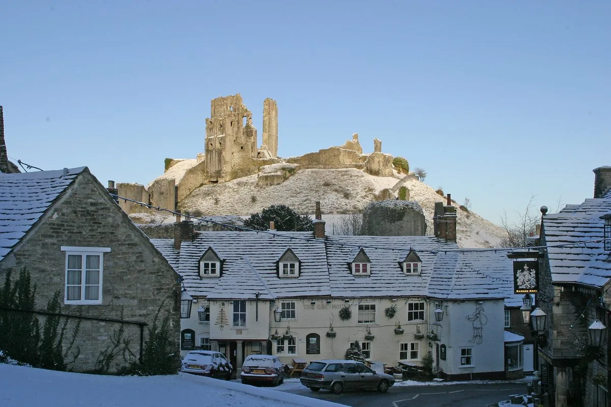 Corfe Castle ruins in winter snow