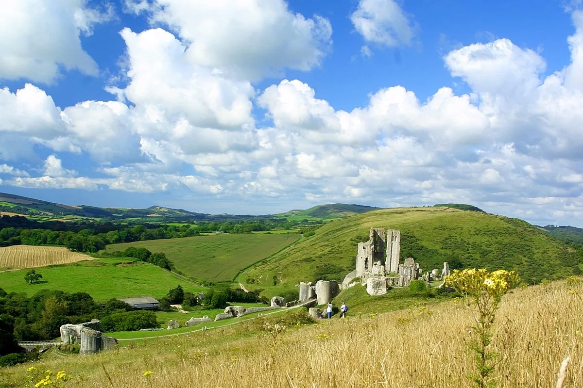 Corfe Castle village and the castle above