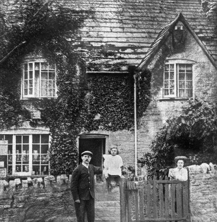 Harry and Edith Barnes, who ran Tyneham's post office, with their daughter