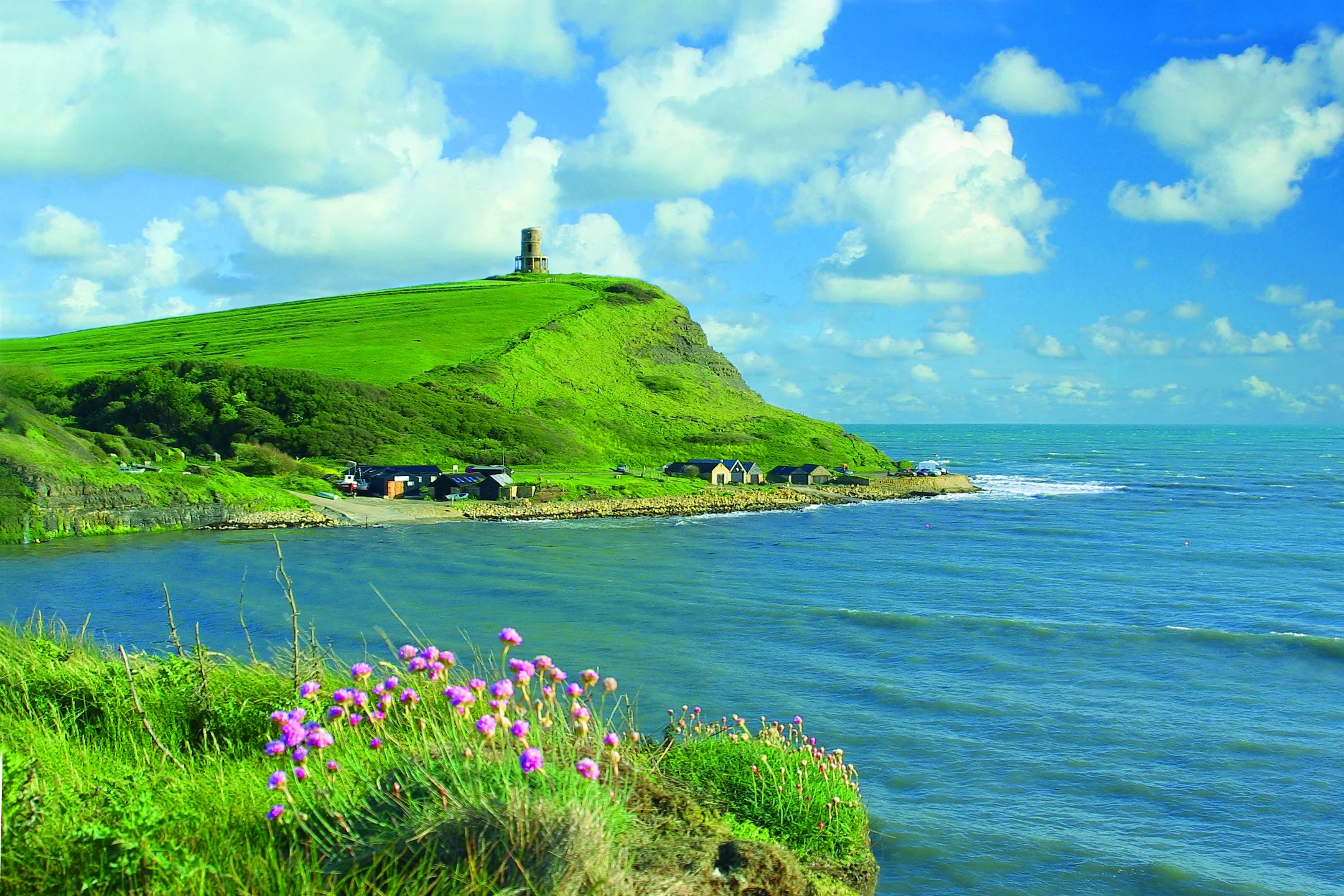 Kimmeridge Bay with the Clavell Tower on the headland above